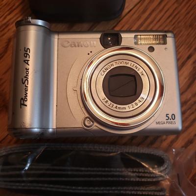 Minolta X-370 With Sigma Lens and Canon Powershot A95 (BR1-KD)