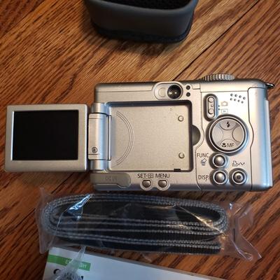 Minolta X-370 With Sigma Lens and Canon Powershot A95 (BR1-KD)