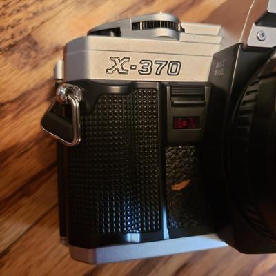 Minolta X-370 With Sigma Lens and Canon Powershot A95 (BR1-KD)