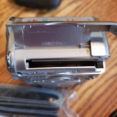 Minolta X-370 With Sigma Lens and Canon Powershot A95 (BR1-KD)