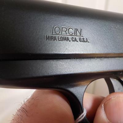 Lorcin model L380 pistol,  .380 cal auto, / est. $175 to $ 300.