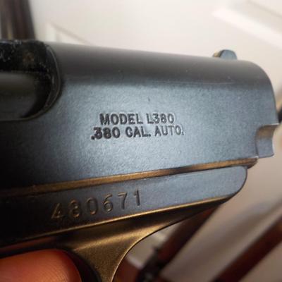 Lorcin model L380 pistol,  .380 cal auto, / est. $175 to $ 300.