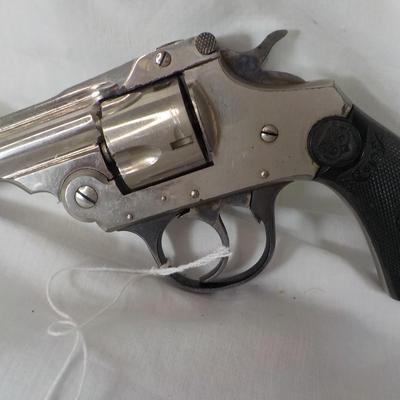 Iver- Johnson 32 cal / 5 shot revolver/ est $110 to $200.