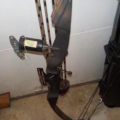 Compound 80, Bow and arrow set with case...est. $130 to $310.