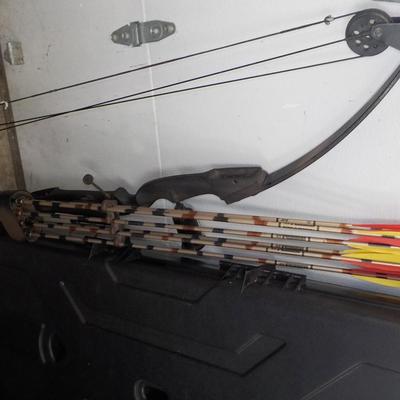 Compound 80, Bow and arrow set with case...est. $130 to $310.