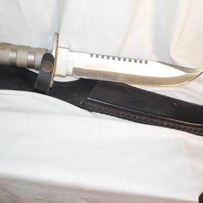 All metal Bowie Knife 12 in and survivle in handle/ est. $20 to $50.