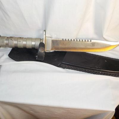 All metal Bowie Knife 12 in and survivle in handle/ est. $20 to $50.