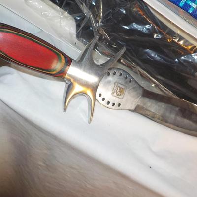 Medieval Hornet Bowie Knife 17 in with sheath. / est $25 to $75.