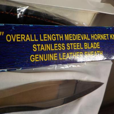 Medieval Hornet Bowie Knife 17 in with sheath. / est $25 to $75.
