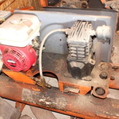 Portable double tank, Honda driven compressor. / est. $300 to $1200