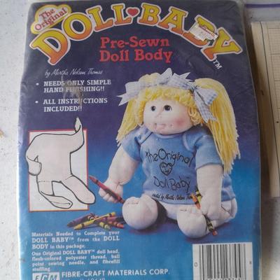 Crafting, needlework, kits and build a baby doll