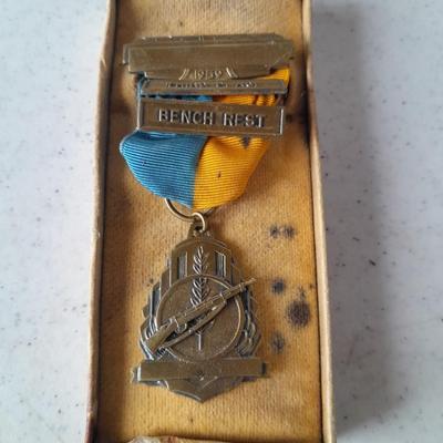 Infantry Drill Regulations US Army 1911 book, Life Pearl Harbor, mask and 1959 Bench rest medal