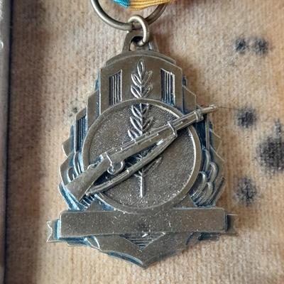 Infantry Drill Regulations US Army 1911 book, Life Pearl Harbor, mask and 1959 Bench rest medal