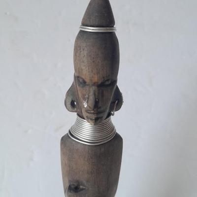 Wooden Carved in Rotorua New Zealand boat and Wood carved African statue