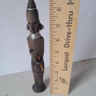 Wooden Carved in Rotorua New Zealand boat and Wood carved African statue