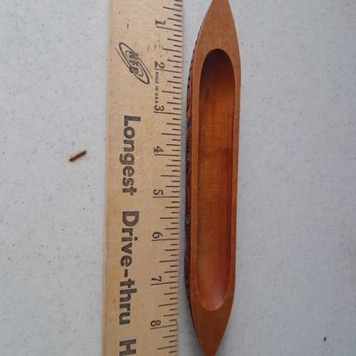 Wooden Carved in Rotorua New Zealand boat and Wood carved African statue