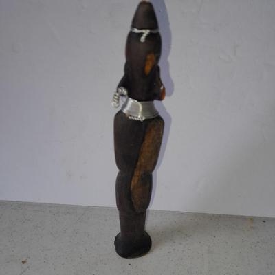 Wooden Carved in Rotorua New Zealand boat and Wood carved African statue