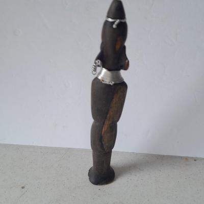 Wooden Carved in Rotorua New Zealand boat and Wood carved African statue