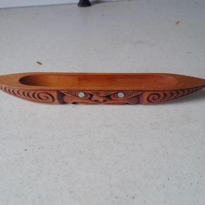 Wooden Carved in Rotorua New Zealand boat and Wood carved African statue