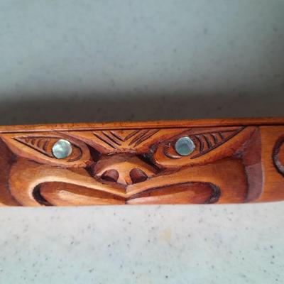 Wooden Carved in Rotorua New Zealand boat and Wood carved African statue