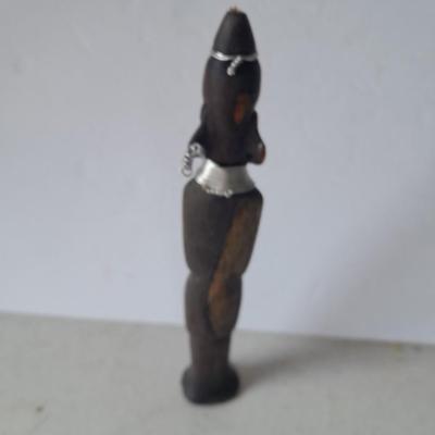 Wooden Carved in Rotorua New Zealand boat and Wood carved African statue