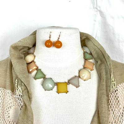 205 Taupe Crochet Shawl with Statement Necklace and Amber Colored Earrings