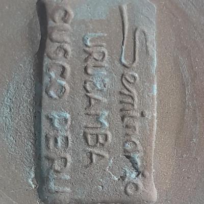 Pottery vases, blue metal, Puru, and Howling Coyote / wolf pottery