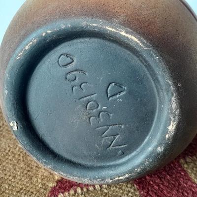 Pottery vase with pottery decor, and a woven Multi Color Durrie