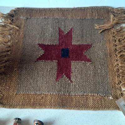 Pottery vase with pottery decor, and a woven Multi Color Durrie