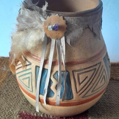 Pottery vase with pottery decor, and a woven Multi Color Durrie