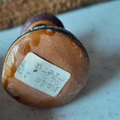 Pottery vase with pottery decor, and a woven Multi Color Durrie