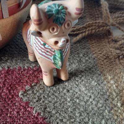 Pottery vase with pottery decor, and a woven Multi Color Durrie