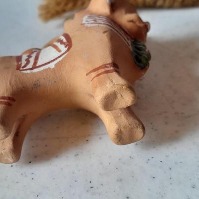 Pottery vase with pottery decor, and a woven Multi Color Durrie