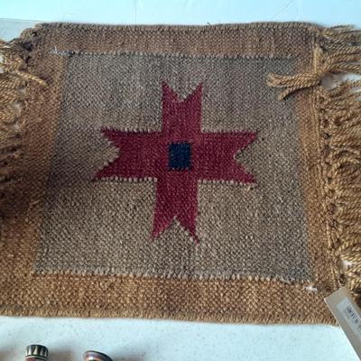 Pottery vase with pottery decor, and a woven Multi Color Durrie