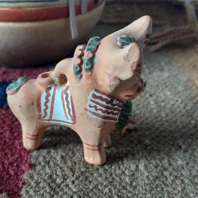 Pottery vase with pottery decor, and a woven Multi Color Durrie