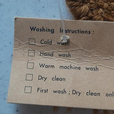 Pottery vase with pottery decor, and a woven Multi Color Durrie