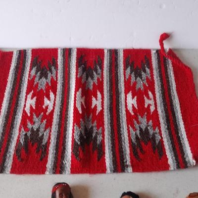 Signed pottery vase with Native dolls and Native. table throw rug