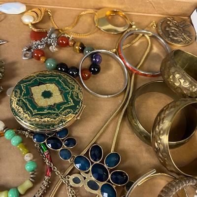 Tray of Jewels: Bracelets, Compact, Coin & Necklaces. 