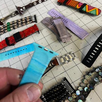Pile of Smart Watch Bands New and Used