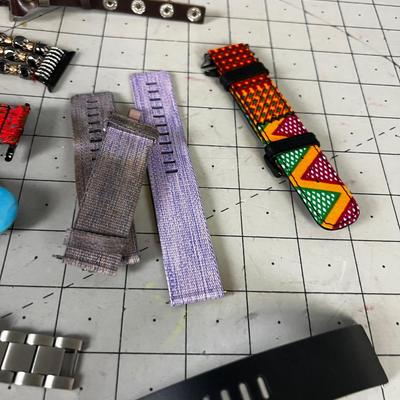 Pile of Smart Watch Bands New and Used