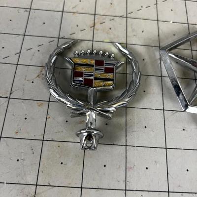 Couple of Automobile Emblems From the 80's 
