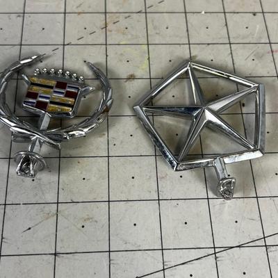 Couple of Automobile Emblems From the 80's 