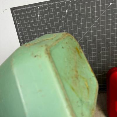Green Plastic Watering Can and Gas Can