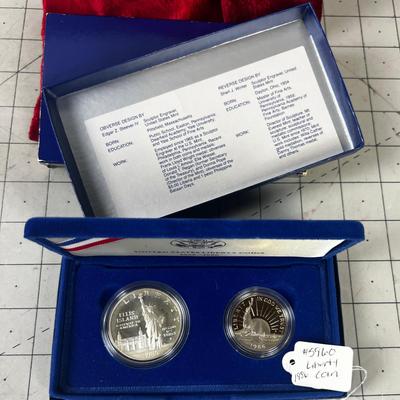 1986 Liberty Coin Set Dollar & Half Dollar. Both Depict the Statue of Liberty