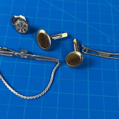 Small Pile of Men's Jewelry: Cuff Links and Tie Bars