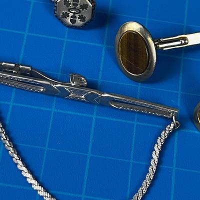Small Pile of Men's Jewelry: Cuff Links and Tie Bars