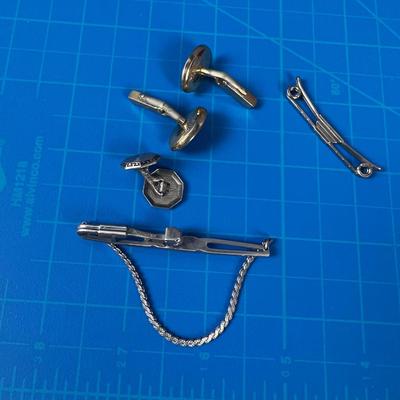 Small Pile of Men's Jewelry: Cuff Links and Tie Bars