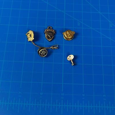 Pile of Lapel Pins: Eagle, Ogden High School, LDS 