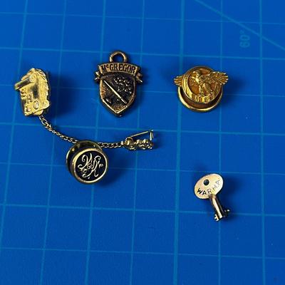 Pile of Lapel Pins: Eagle, Ogden High School, LDS 