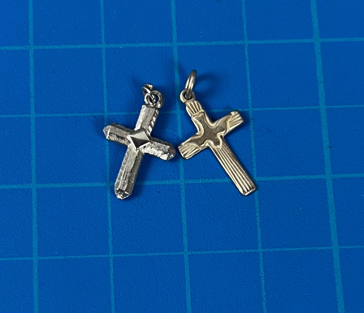 2 Silver Crosses 1 is marked 925 | EstateSales.org